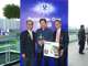 (Left) Mr David Mong presented a Trophy and a Panasonic Pressure Cooker to winning owner of non-trophy race.